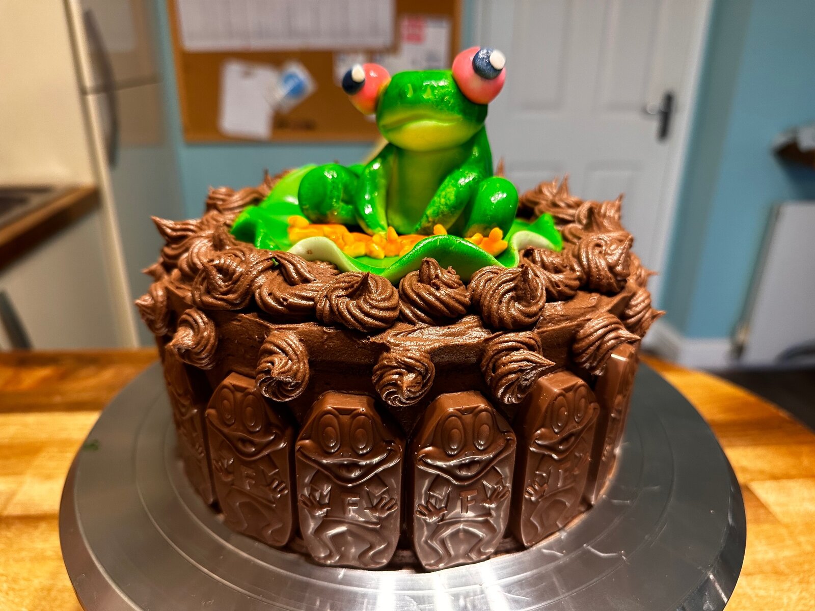 Chocolate frog-themed birthday cake